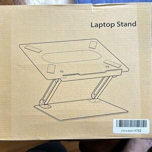 COPY - Laptop stand brand new. Silver